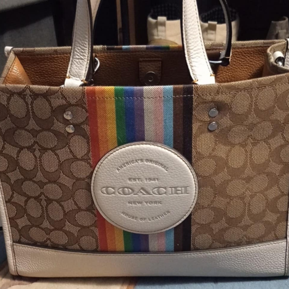 Trying to trade my new coach Dempsey bag just for something diff ex condition